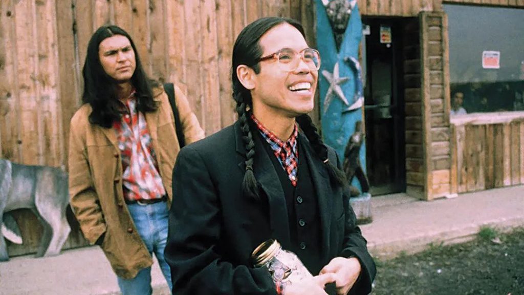 A still from "Smoke Signals" featuring the two leads