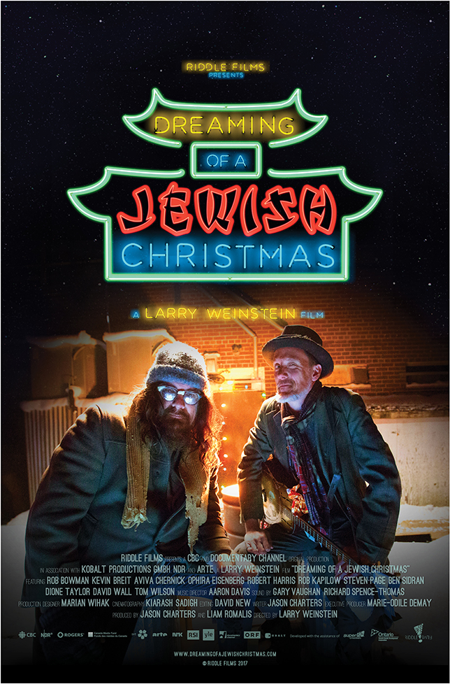A poster for "Dreaming of a Jewish Christmas" featuring two men sitting out in the cold and facing the camera while one of them holds a guitar