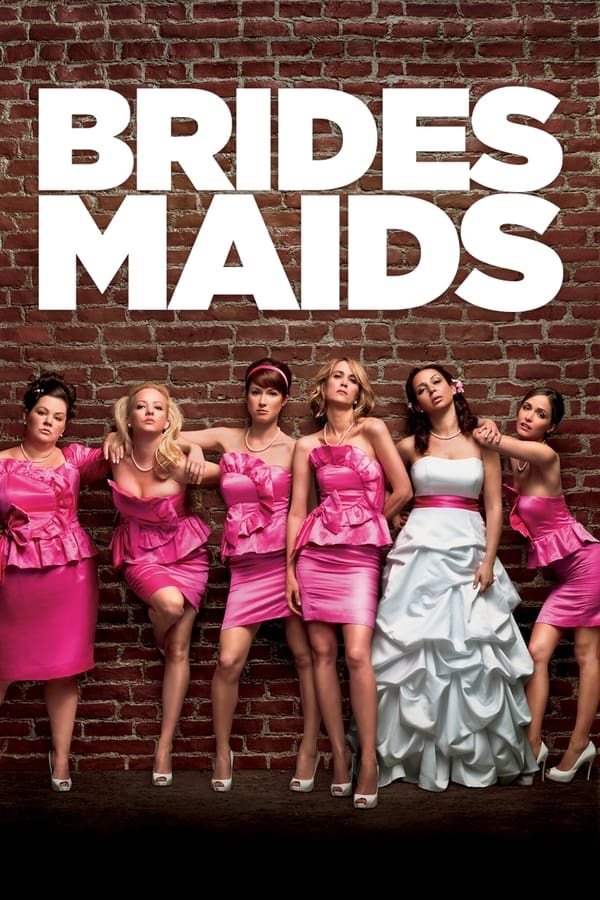 Poster for "Bridesmaids" featuring a woman in a wedding gown and 5 women in pink dresses posing in front of a brick wall