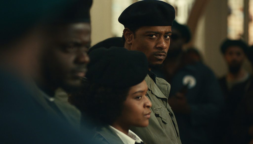 Still from "Judas and the Black Messiah" featuring a member of the Black Panther Party staring towards the camera