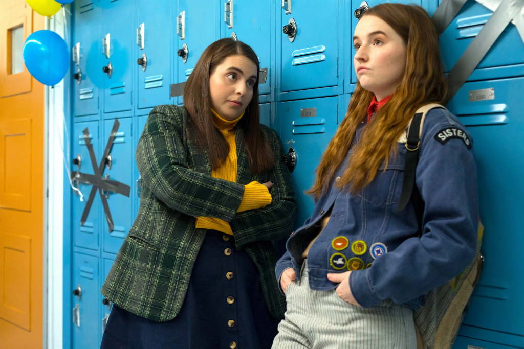 Still from "Booksmart" featuring two teenage girls leaning against a row of lockers