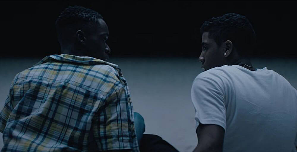 Still from "Moonlight" featuring two teen boys gazing into each other's eyes