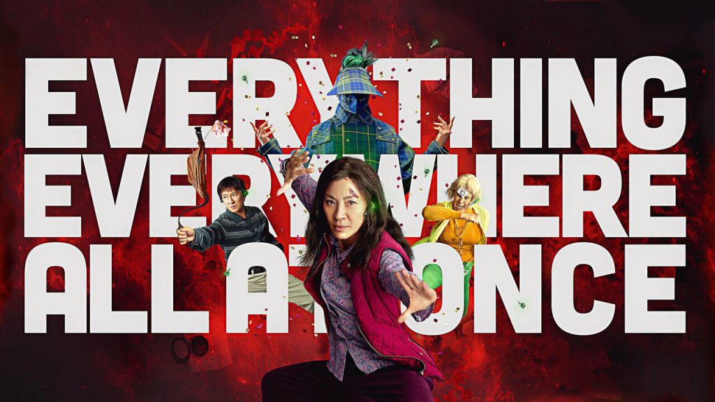Promotional photo for "Everything Everywhere All At Once" featuring the main characters standing in front of the title in fighting poses