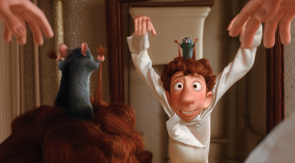 An animated red-haired man stands looking in his bathroom mirror in a chef's outfit with his hands raised. A gray rat is perched on his head, holding strands of his hair, seemingly controlling him like a puppet. 