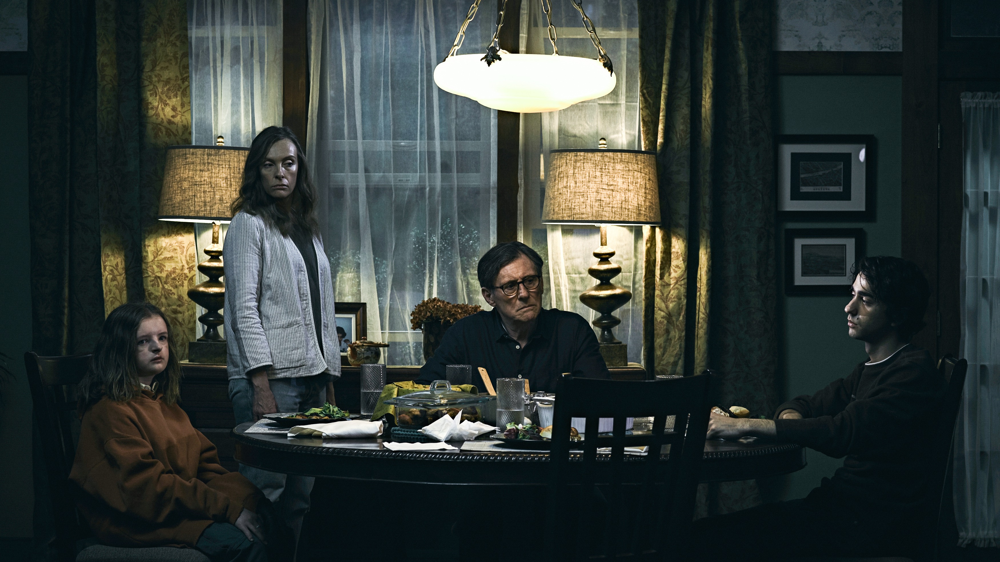 Scene in Hereditary where the family are all sitting at the dinner table